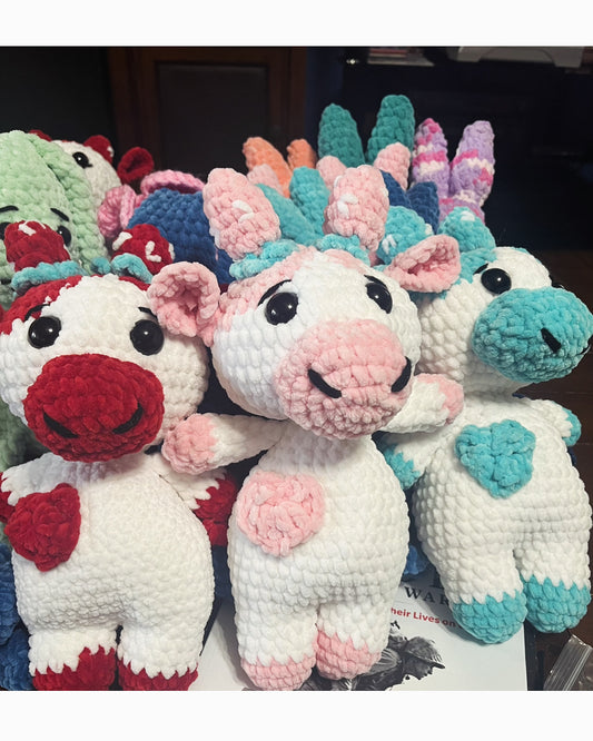 Crocheted plushie cows